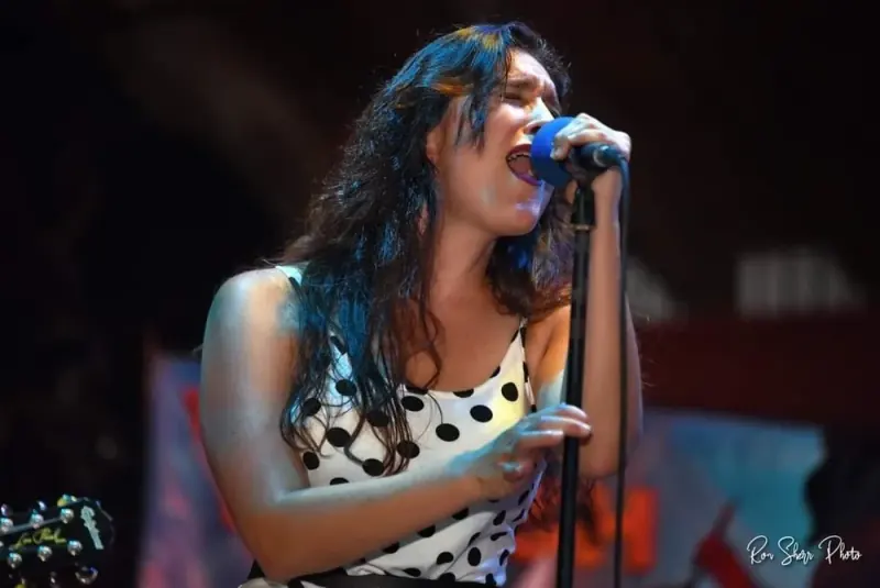 Casey Sky singing on stage